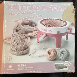 Knitting Maching With Yarn In Open Box
